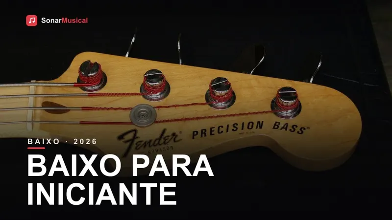 Mão de um Fender Precision Bass com tarraxas de baixo
