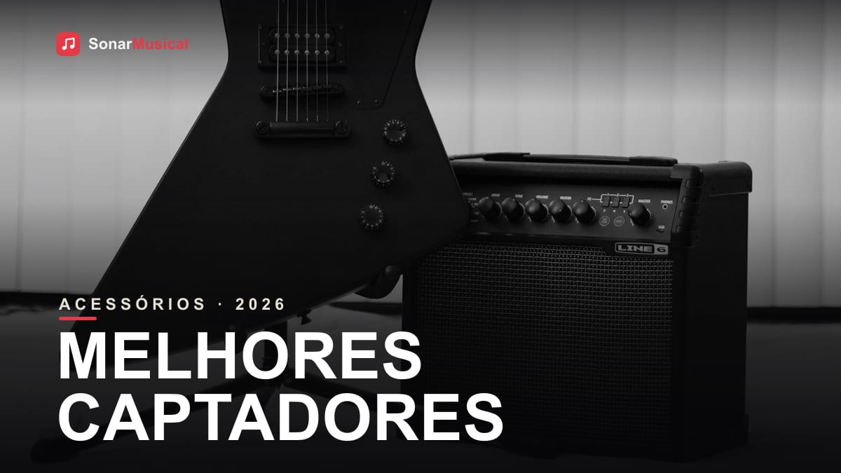 Captador humbucker aberto mostrando as bobinas e os polos sobre bancada de luthier